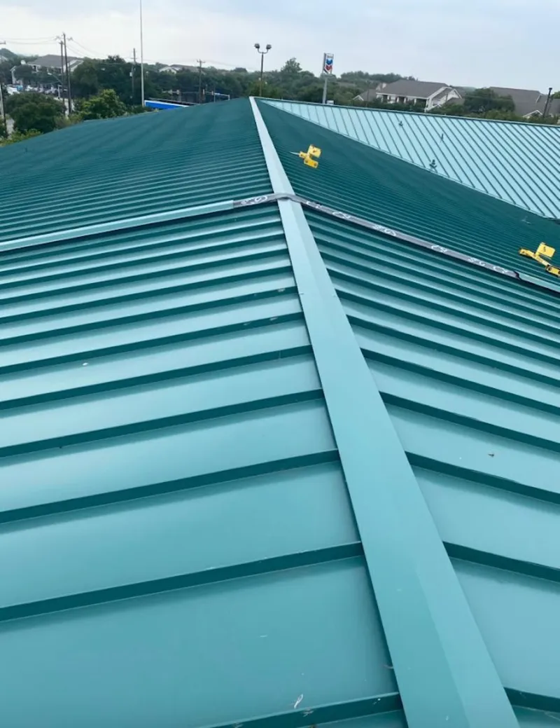 Green commercial metal roof ridge and valley for Metal Roof Repair in Timnath